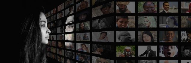 Woman looking at pictures of various people